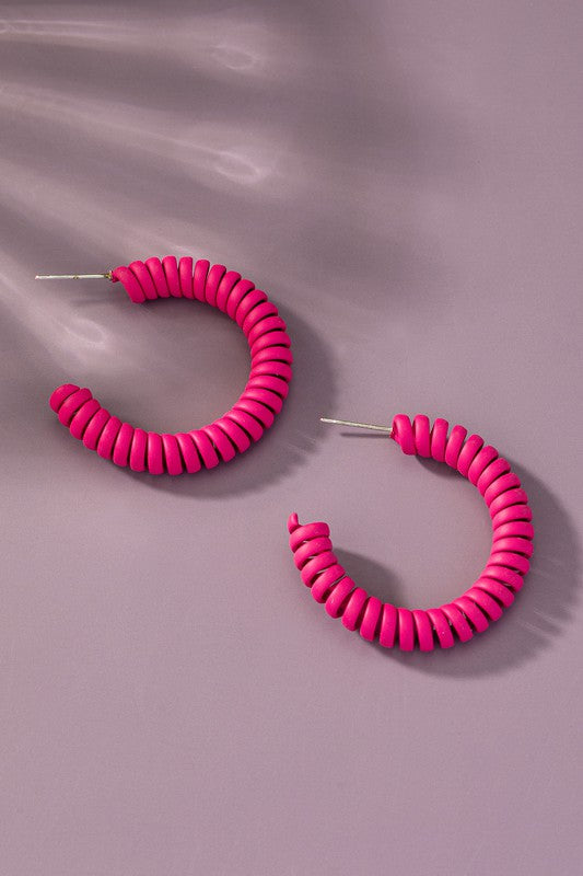 Spiral metal hoop earrings with color coating