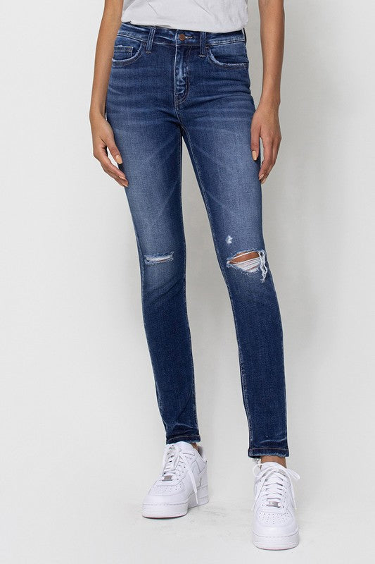 MID RISE ANKLE SKINNY W DISTRESSED HEM