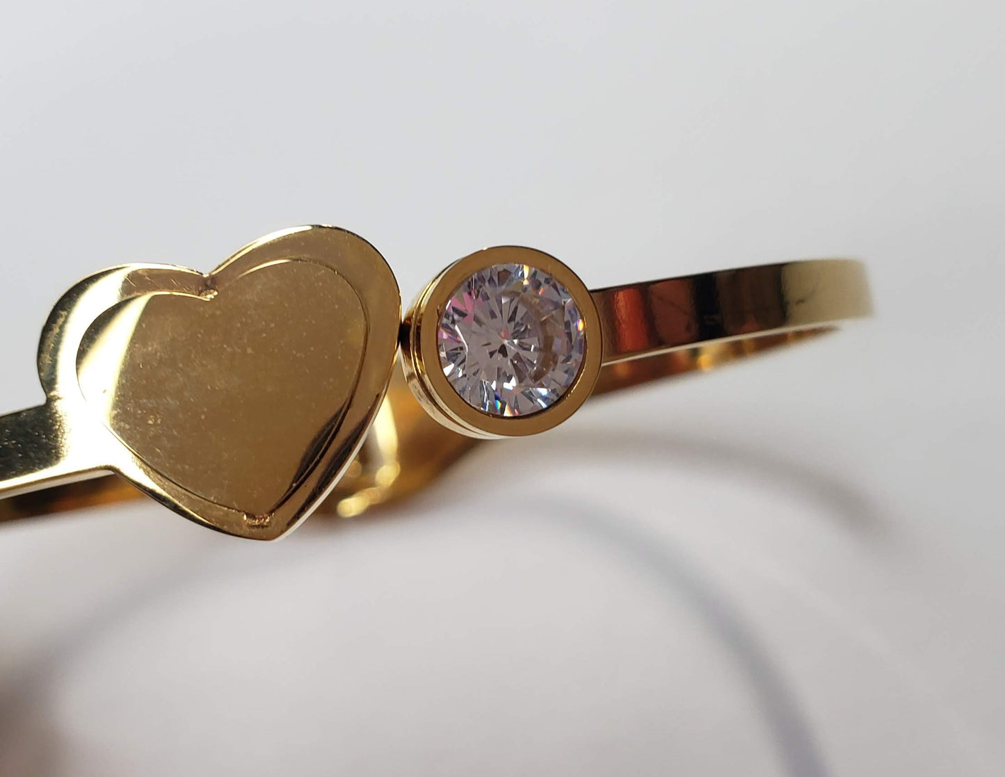 Stainless Steel Gold Cubic Zirconia Heart Cuff Bracelet Size: 2.5" - Touch Me Textures